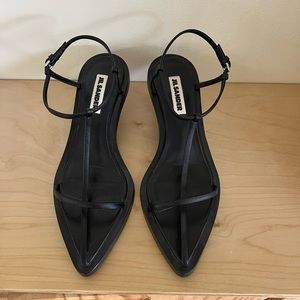 Jil Sander pointed toe kitten heel sandals with interwoven straps.